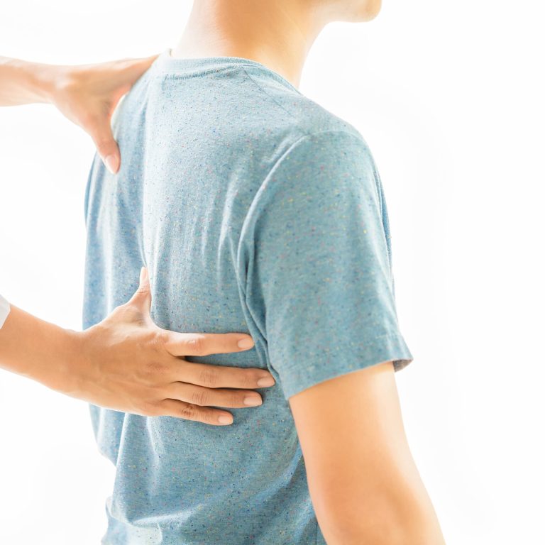 Physical therapists are examining the patient's body.